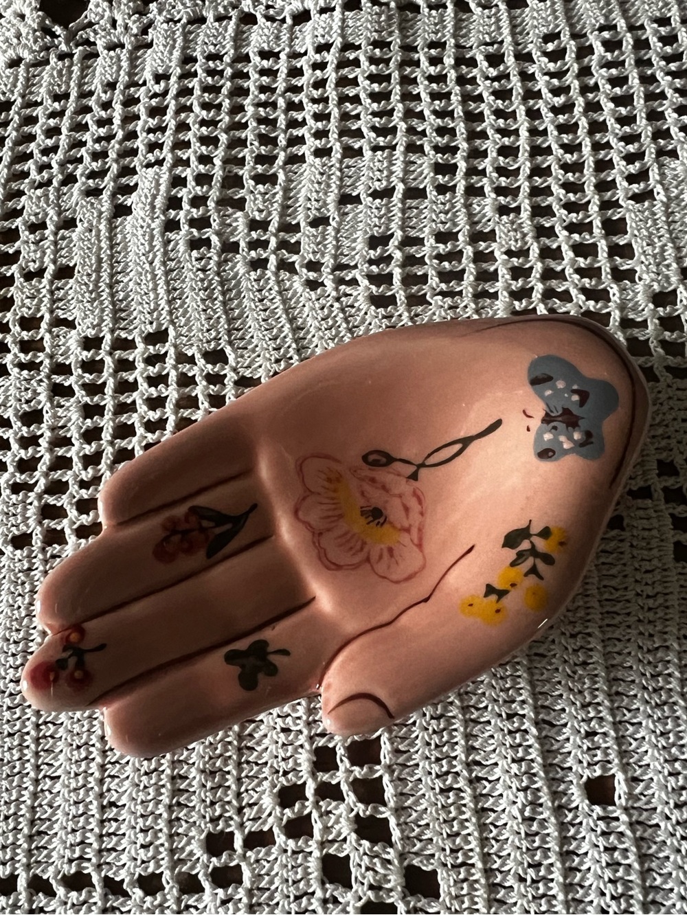 This Nathalie Lete for Anthropologie hand-shaped ceramic trinket dish